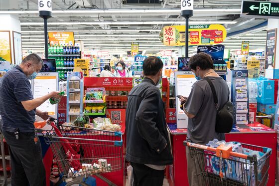 After Years in Prison, China Grocery Tycoon Weighs Twin IPOs