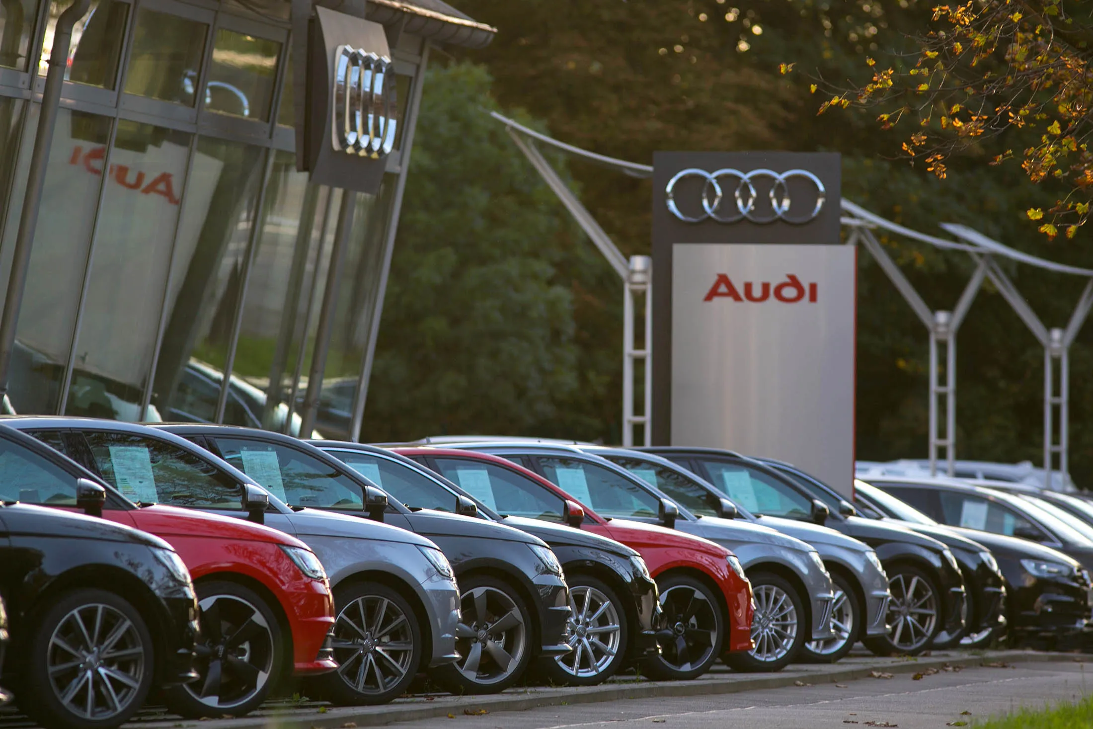 Audi vehicles sit outside a showroom in Leipzig, Germany.
