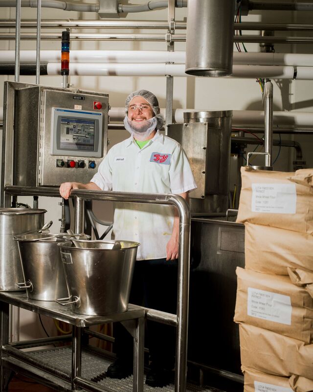 Micah Hoover, a batter attendant at the Hermitage plant, at a waffle cone mixing station.