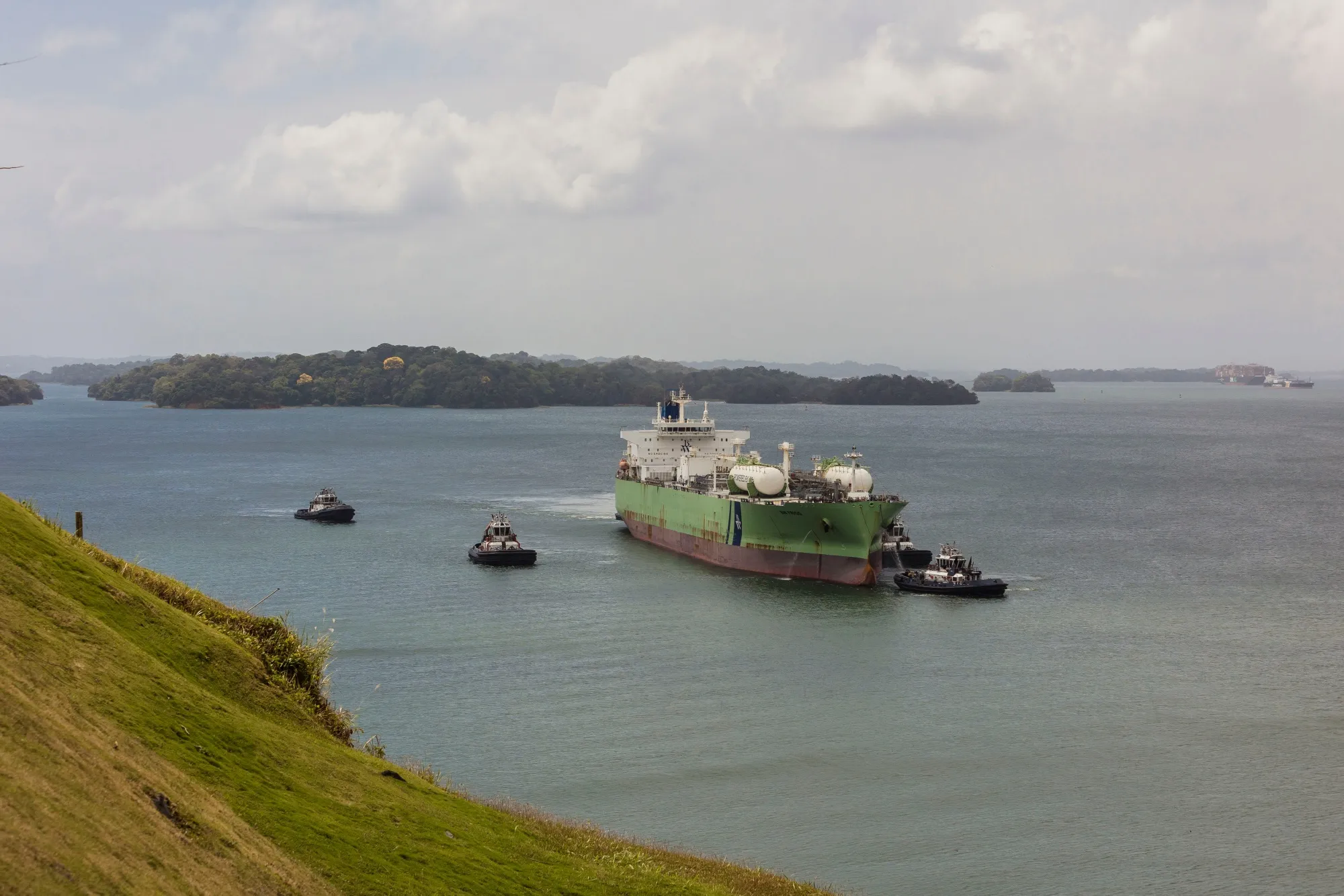 A vessel is guided through&nbsp;the Panama Canal.&nbsp;The Panama Canal’s vulnerability to drought recently caused long wait times and costly disruptions for shippers.