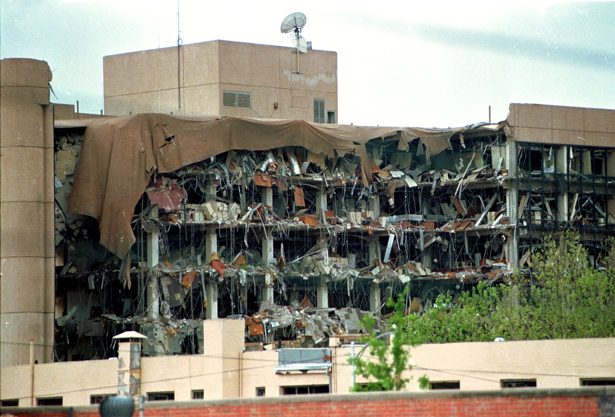 Protective covering drapes over the Alfred P. Murrah Federal Building in Oklahoma City, after the terrorist attack that killed 168 people in 1995.