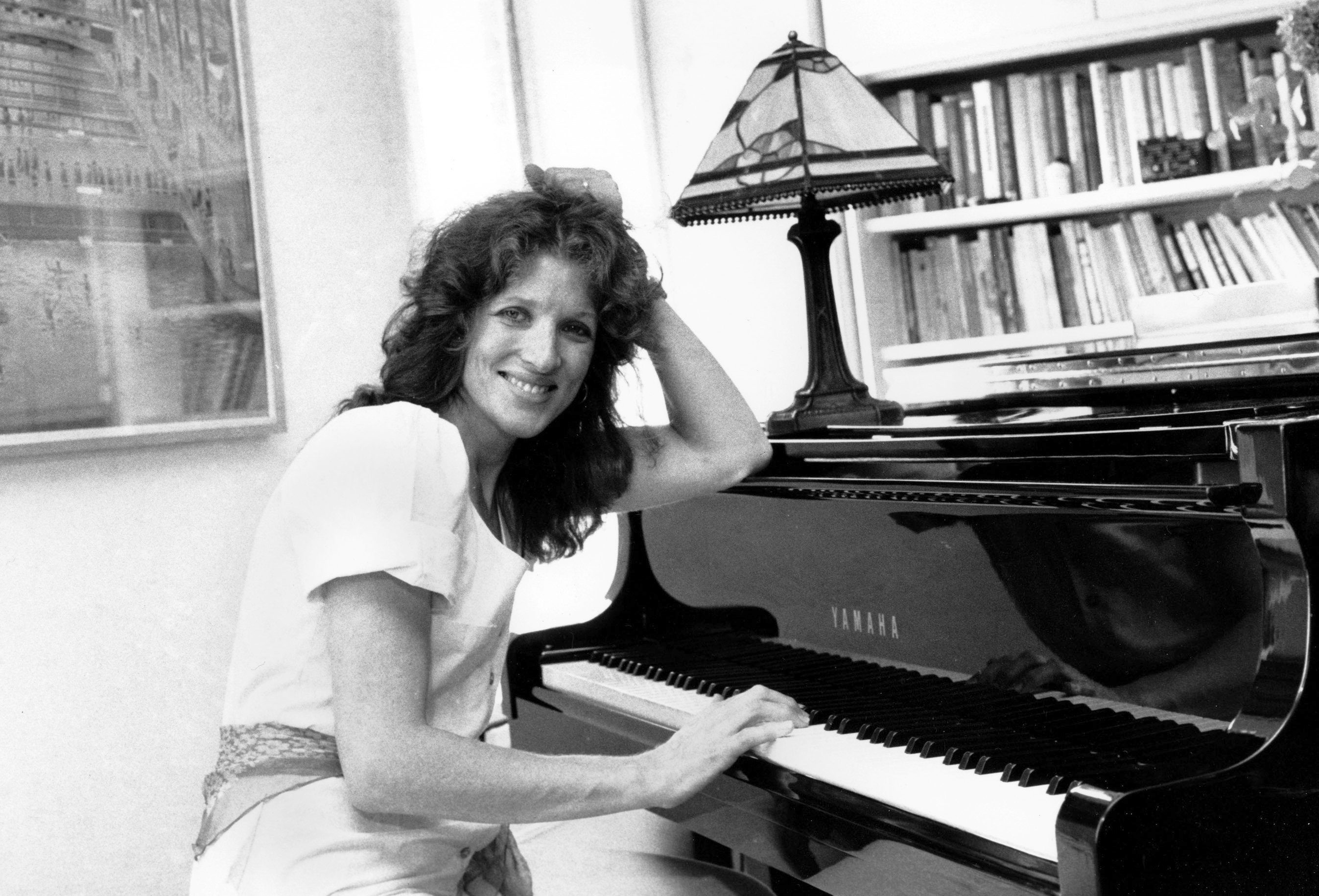 Lucy Simon sits at the piano in her New York apartment on May 28, 1982. Lucy Simon, the composer who received a Tony nomination in 1991 for her work on the long-running Broadway musical “The Secret Garden,” died Thursday at her home in Piedmont, N.Y., after a long battle with breast cancer. She was 82. (AP Photo, File)