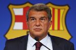 FC Barcelona club President Joan Laporta pauses during a news conference in Barcelona, Spain, on Aug. 6, 2021. Spain Barcelona’s members late on Thursday approved a plan to sale part of its television rights and future revenues from merchandise and licensing in hopes of injecting an immediate 600 million euros ($631 million) into the debt-ridden Spanish club. (AP Photo/Joan Monfort, File)
