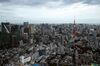 The Tokyo Tower, right, stands among commercial and residential buildings in Tokyo, Japan, on Wednesday, Oct. 23, 2019. Japan has been attempting monetary-fiscal coordination since 2013, with a joint statement by the Bank of Japan and Prime Minister Shinzo Abe’s administration pledging to work toward 2% inflation and sustainable economic growth. Under Abenomics, as it’s known, the price goal was supposed to be achieved in just two years. Six years on, inflation is stuck below 1%.