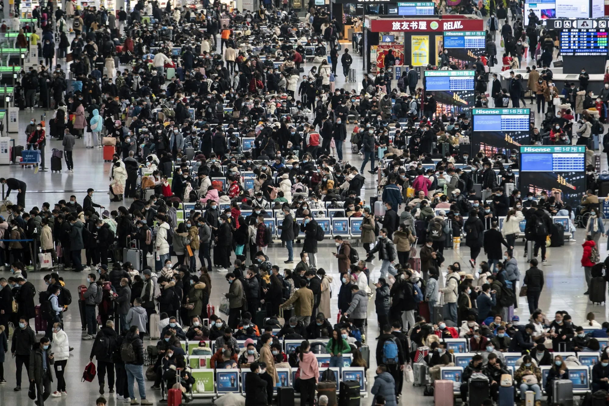 Travelers at the Hongqiao Railway Station ahead of Lunar New Year in Shanghai, Jan. 15.