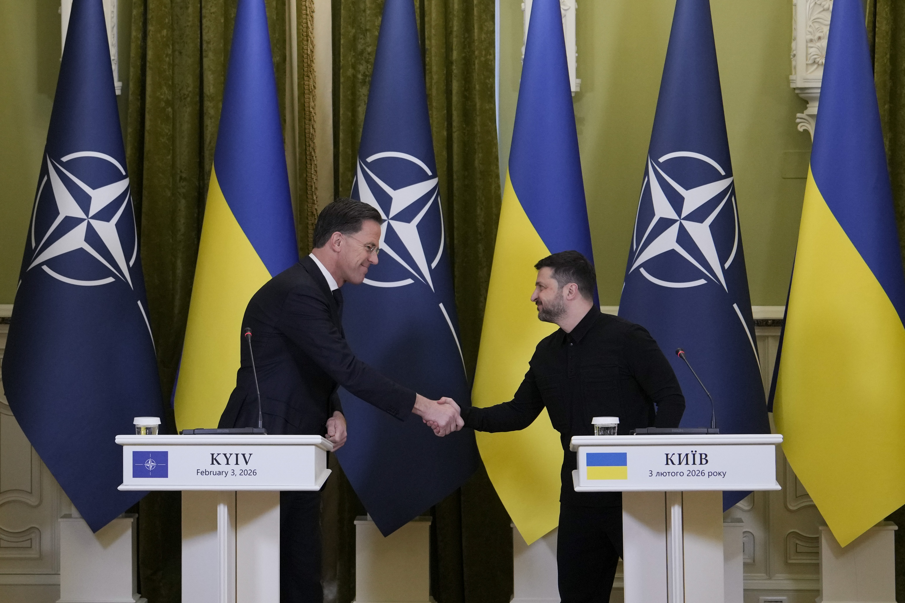 Mark Rutte, secretary general of the North Atlantic Treaty Organization (NATO), left, and Volodymyr Zelenskiy, Ukraine's president, during a news conference in Kyiv, Ukraine, on Tuesday, Feb. 3, 2026. Ukraine faced the biggest Russian missile and drone attack so far this year after the Kremlin ended a brief moratorium on strikes against energy infrastructure. Photographer: Andrew Kravchenko/Bloomberg