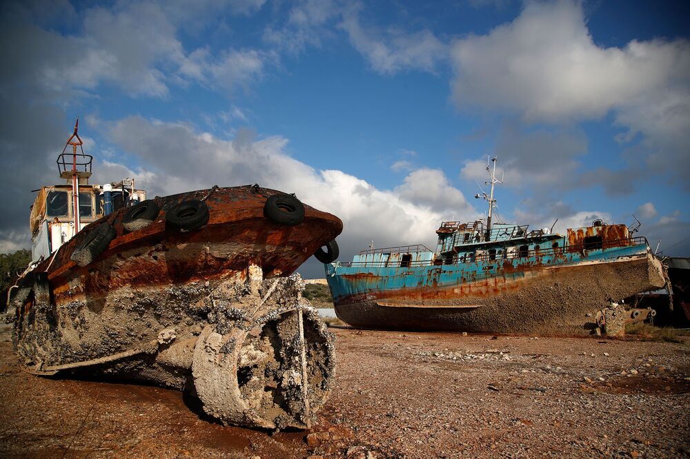 Greece Hauls Abandoned Half Sunken Ships Out Of The Sea