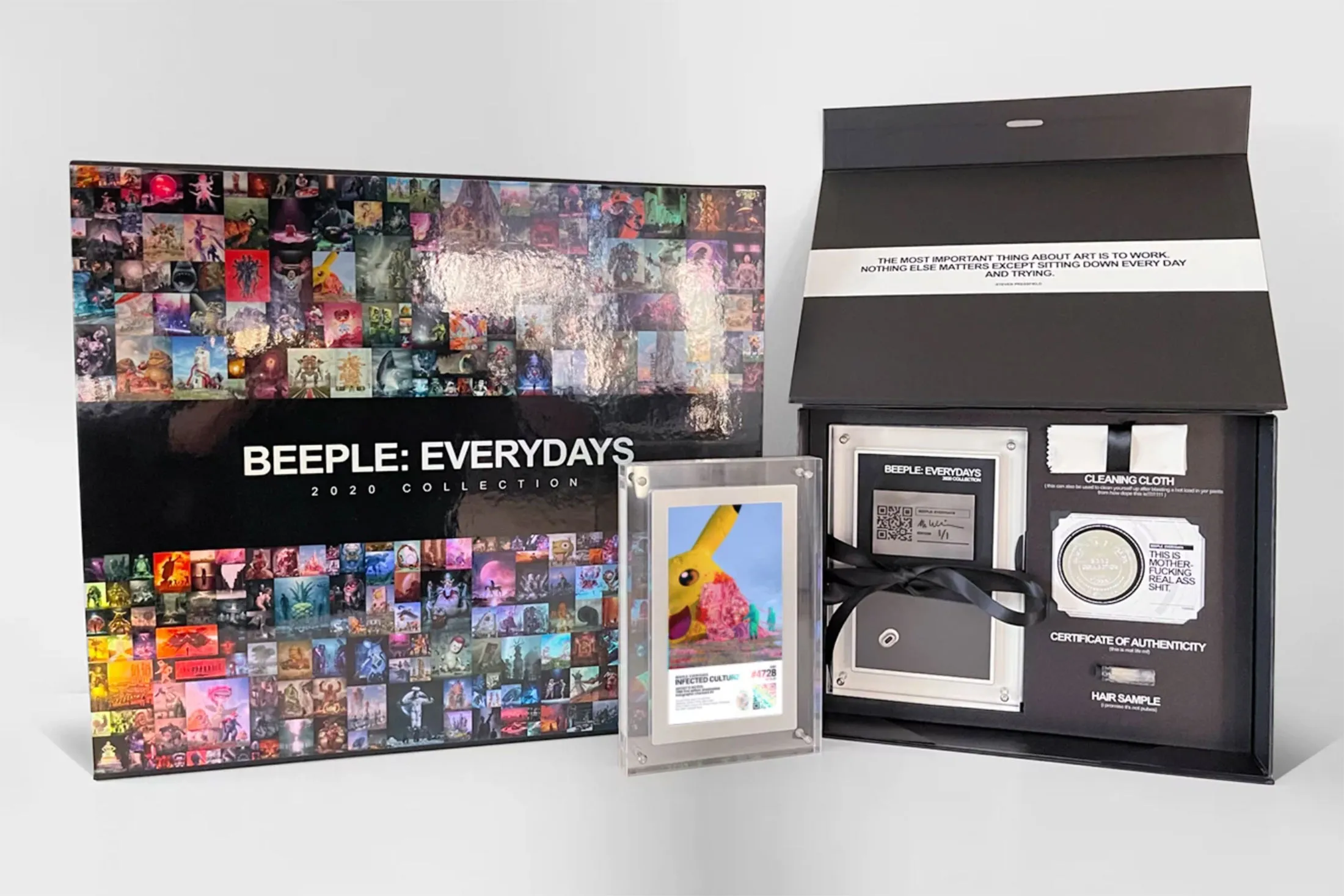 Beeple’s digital art kit with physical coin included.