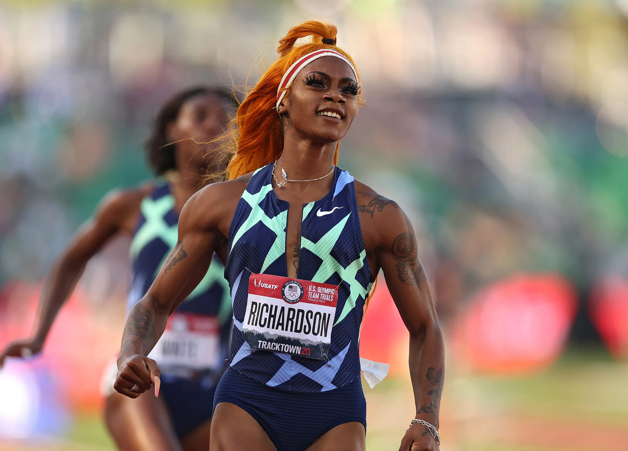 Sha'Carri Richardson runs in the Women's 100 Meter.