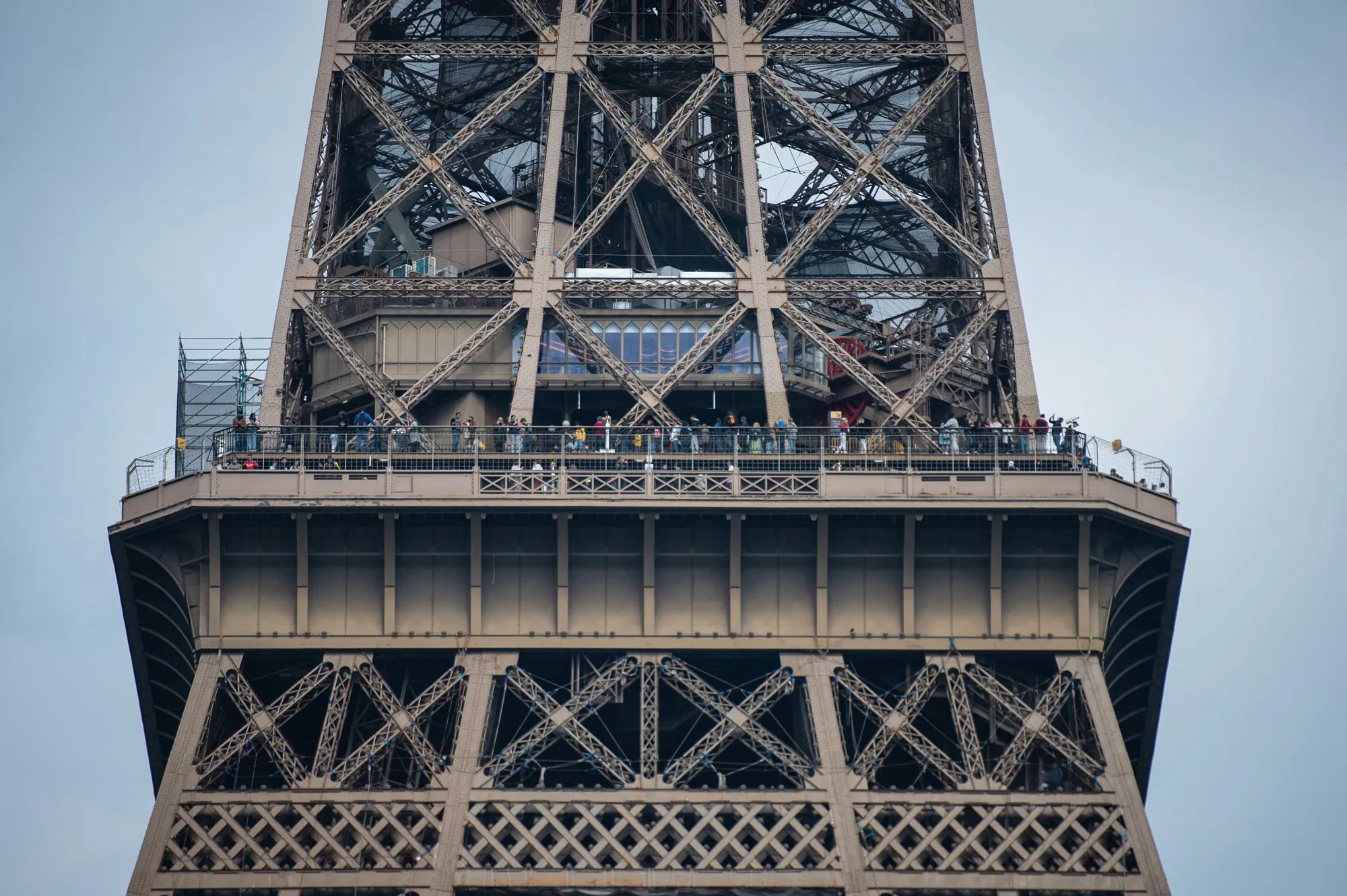 Visitors on the second floor of the Eiffel Tower in Paris, in April.
