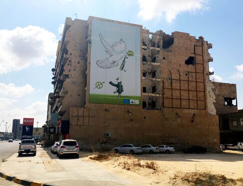A poster showing a peace dove adorns a building on Tripoli Street in Misrata, Libya.