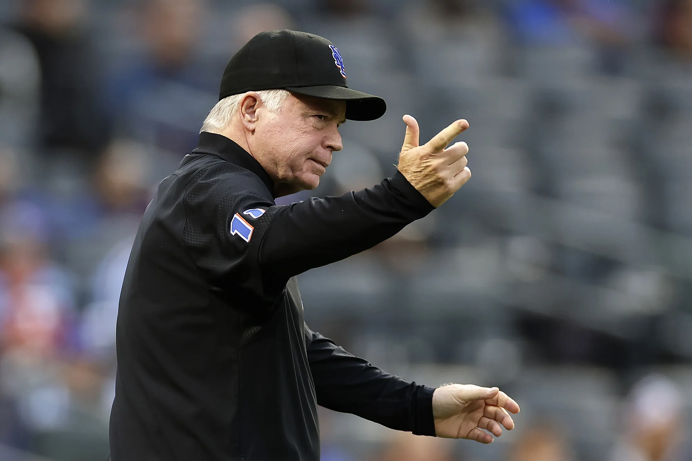 Buck Showalter of the New York Mets&nbsp;signals for a pitching change against the Philadelphia Phillies during the eighth inning of game one of a doubleheader at Citi Field in New York on Sept.&nbsp;30.