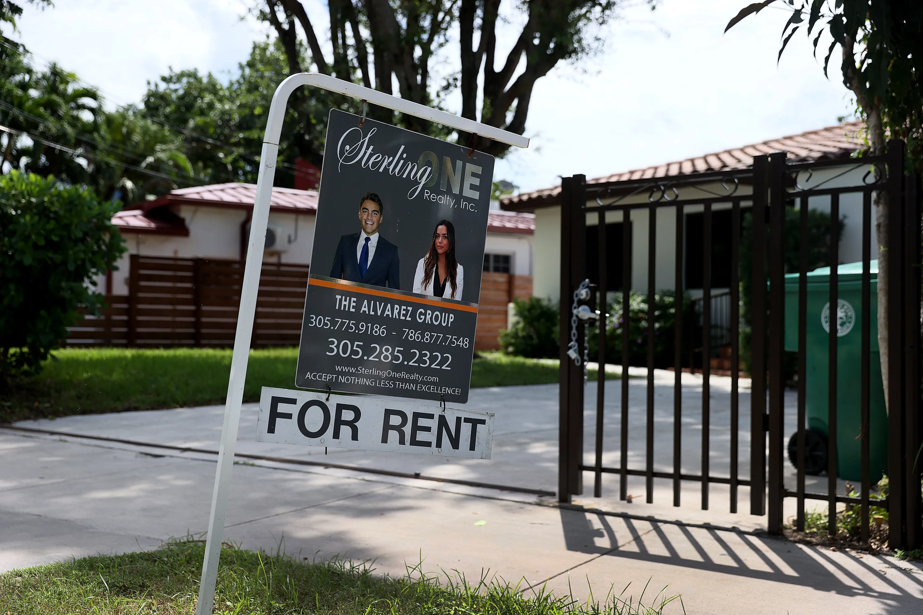 A rent sign hangs outside of a building in Miami, one of several U.S. metro areas&nbsp;posting double-digit rent increases.&nbsp;