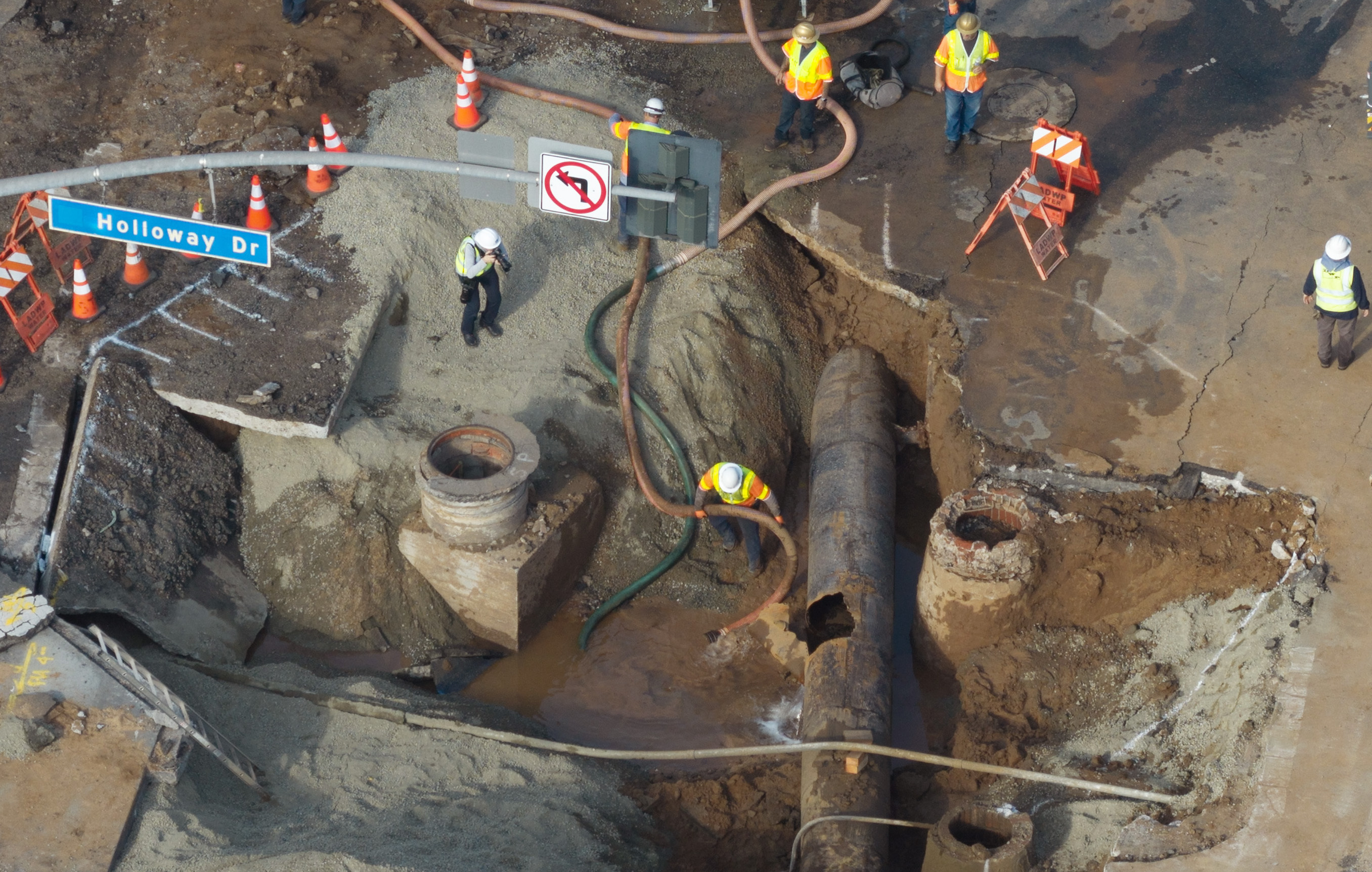 A broken water main in West Hollywood shut down a portion of Sunset Boulevard in July. Photographer: Myung J. Chun/Los Angeles Times via Getty Images
