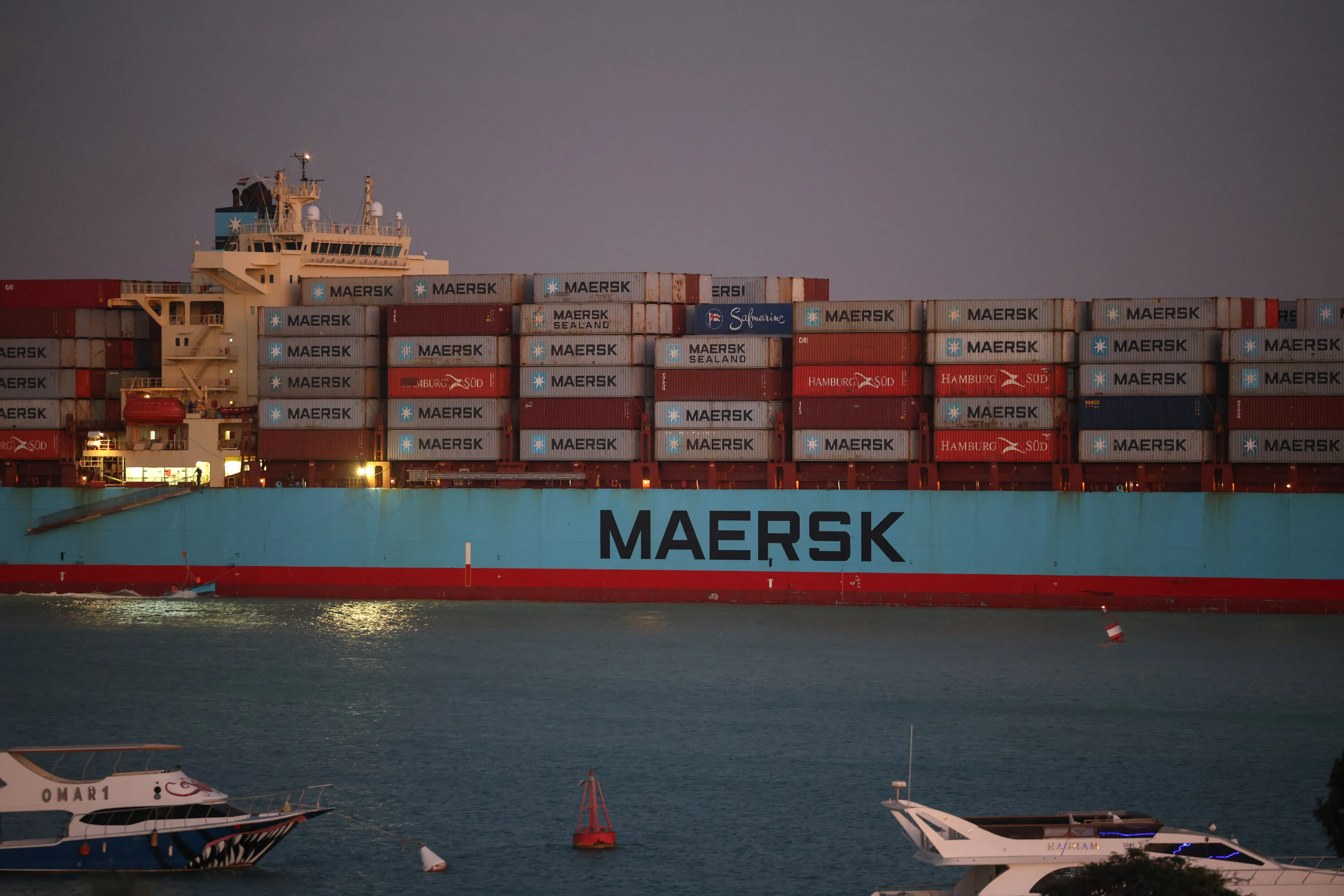The Maersk Sentosa container ship sails southbound to exit the Suez Canal in Suez, Egypt, on Thursday, Dec. 21, 2023.