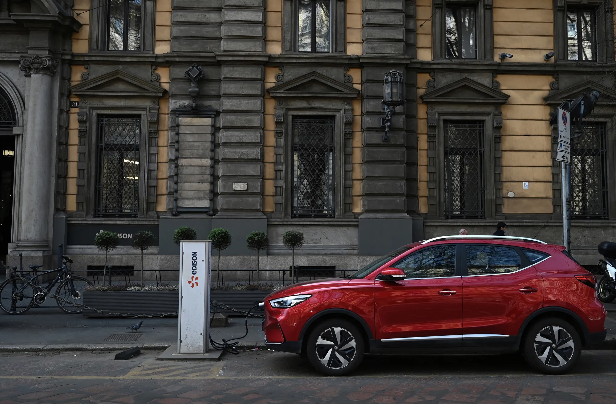 An MG electric SUV charges at a hub in Milan, Italy.