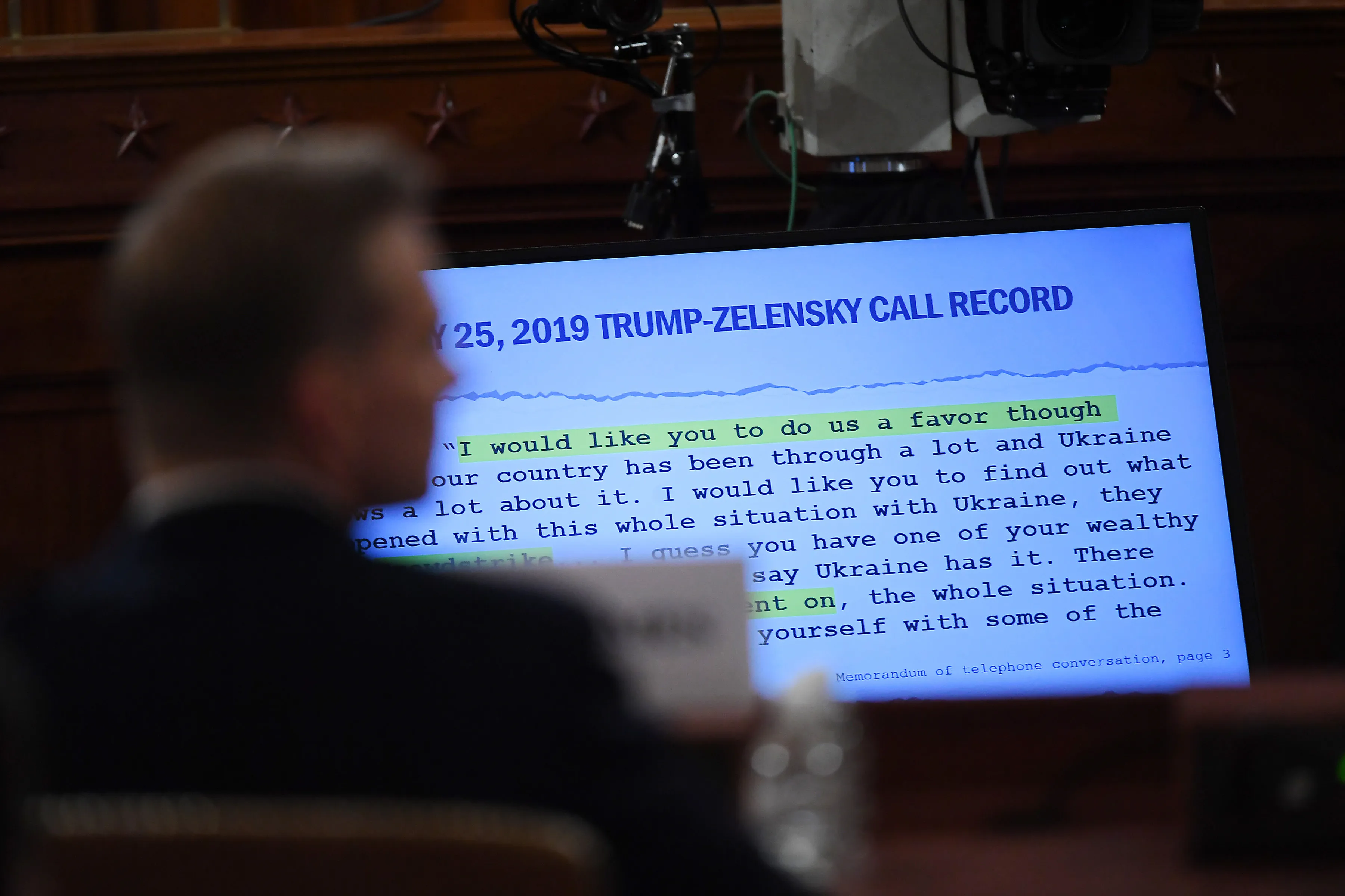 A quote from the call between Donald Trump and Volodymyr Zelenskiy&nbsp;is displayed during a House Intelligence Committee impeachment inquiry hearing in Washington on Nov. 21.