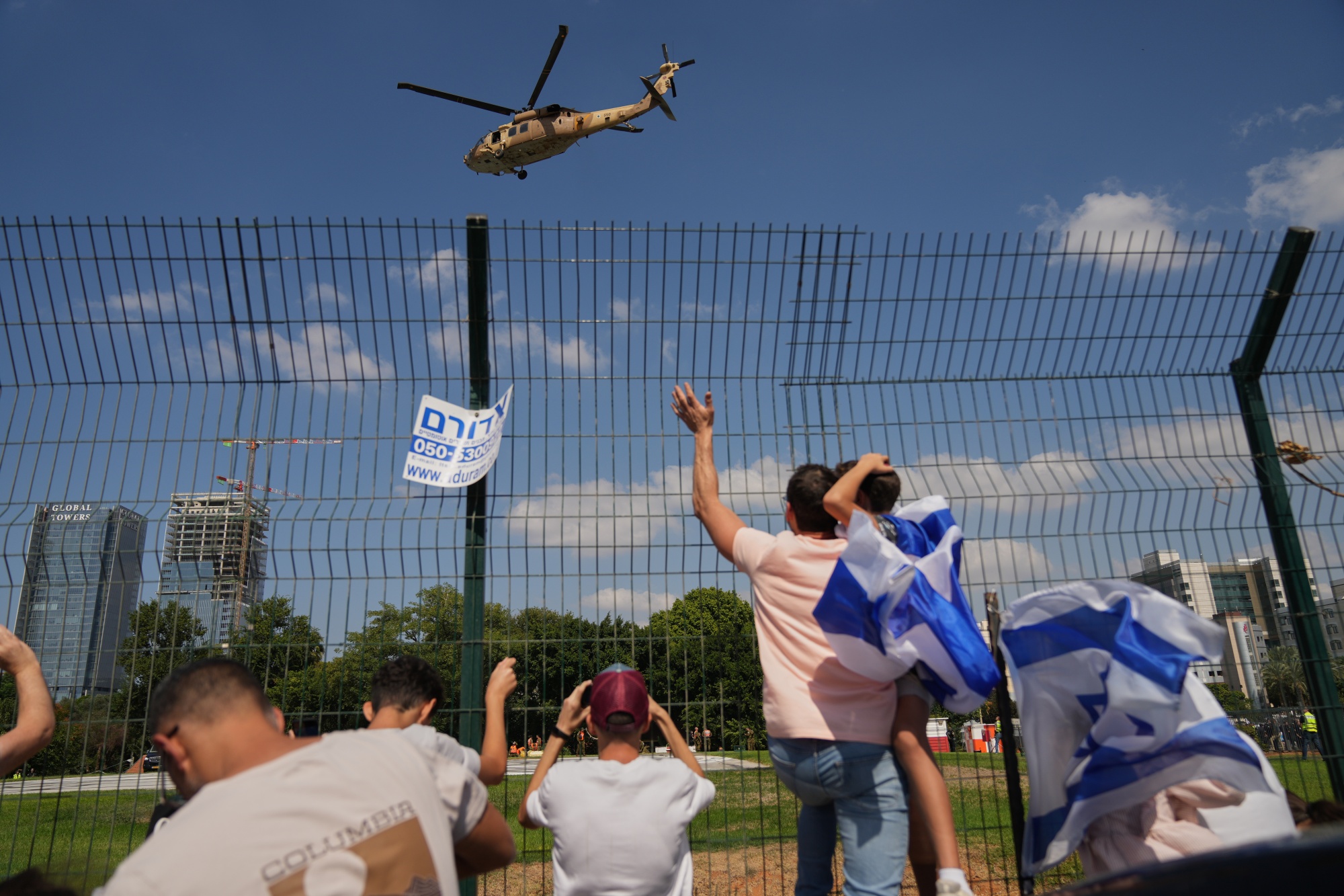 A military helicopter carrying freed Israeli hostages arrives at Beilinson hospital in Petah Tikva, Israel, on Oct. 13.