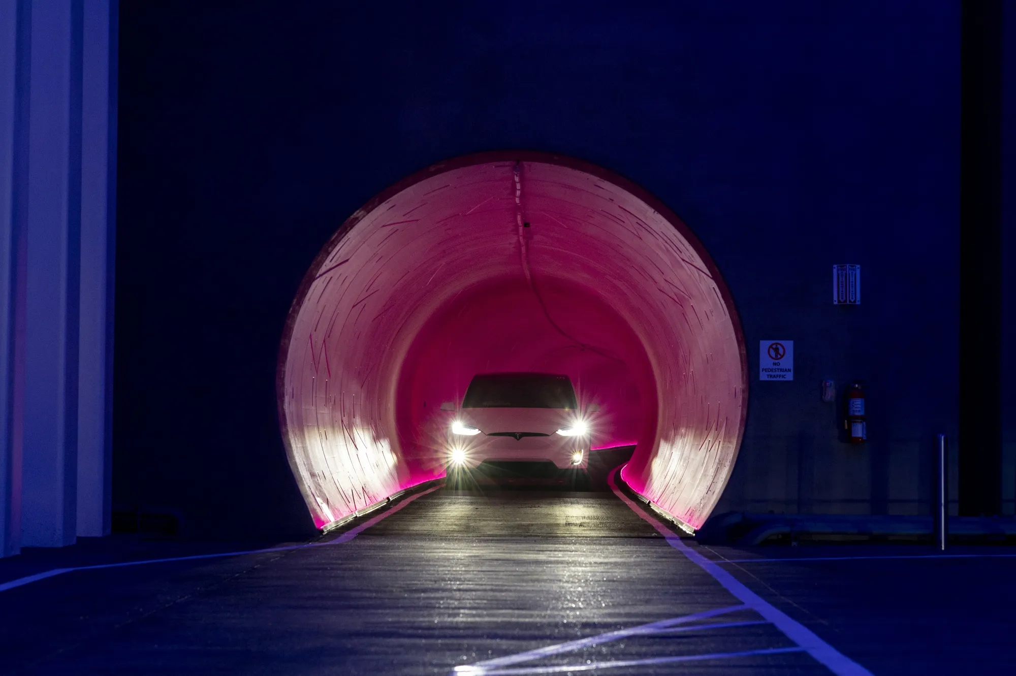 A Tesla Inc. electric vehicle passes through the underground tunnel during a tour of the Boring Co. Convention Center Loop in Las Vegas.