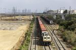 A train carrying shipping containers near the Jawaharlal Nehru Port in Navi Mumbai.