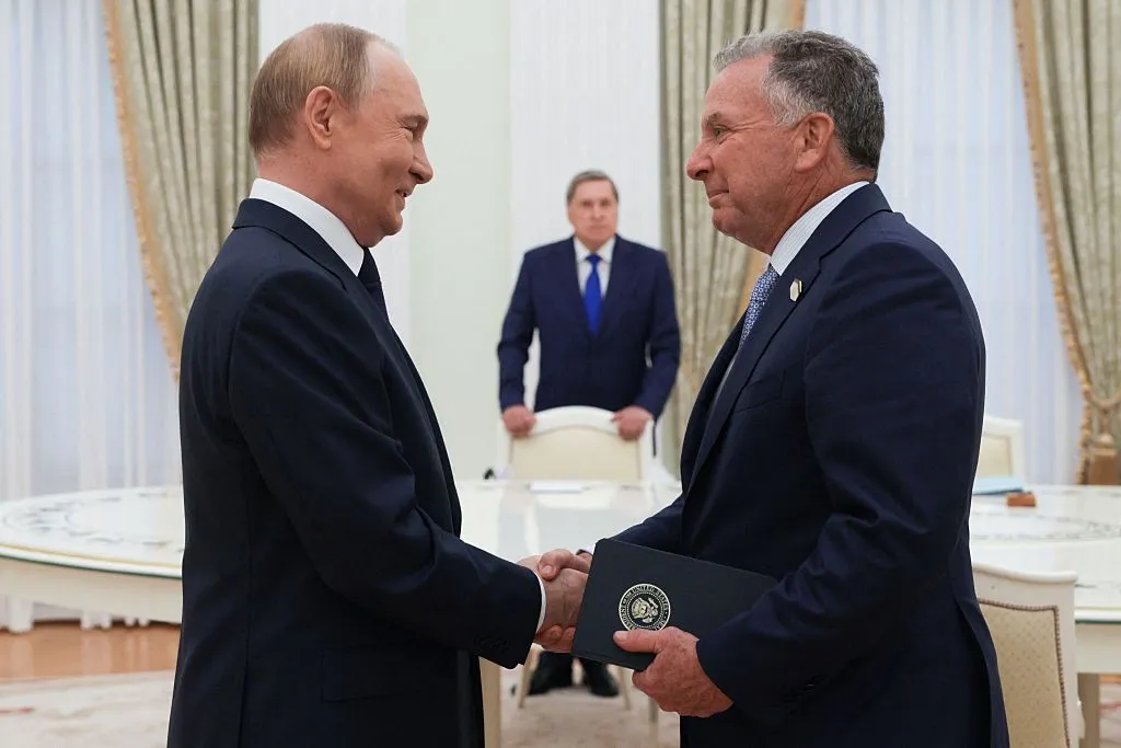 Russia's President Vladimir Putin greets US Special Envoy Steve Witkoff prior to their talks in Moscow on Aug. 6, 2025.