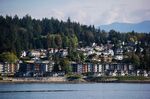 Residential condo buildings and single family houses are seen above Burrard Inlet in North Vancouver, British Columbia, Canada.
Canada Mortgage & Housing Corp., the nation’s housing agency and main provider of mortgage insurance, forecasts that it would remain solvent in all but the most extreme economic scenario envisioned in its annual stress test.