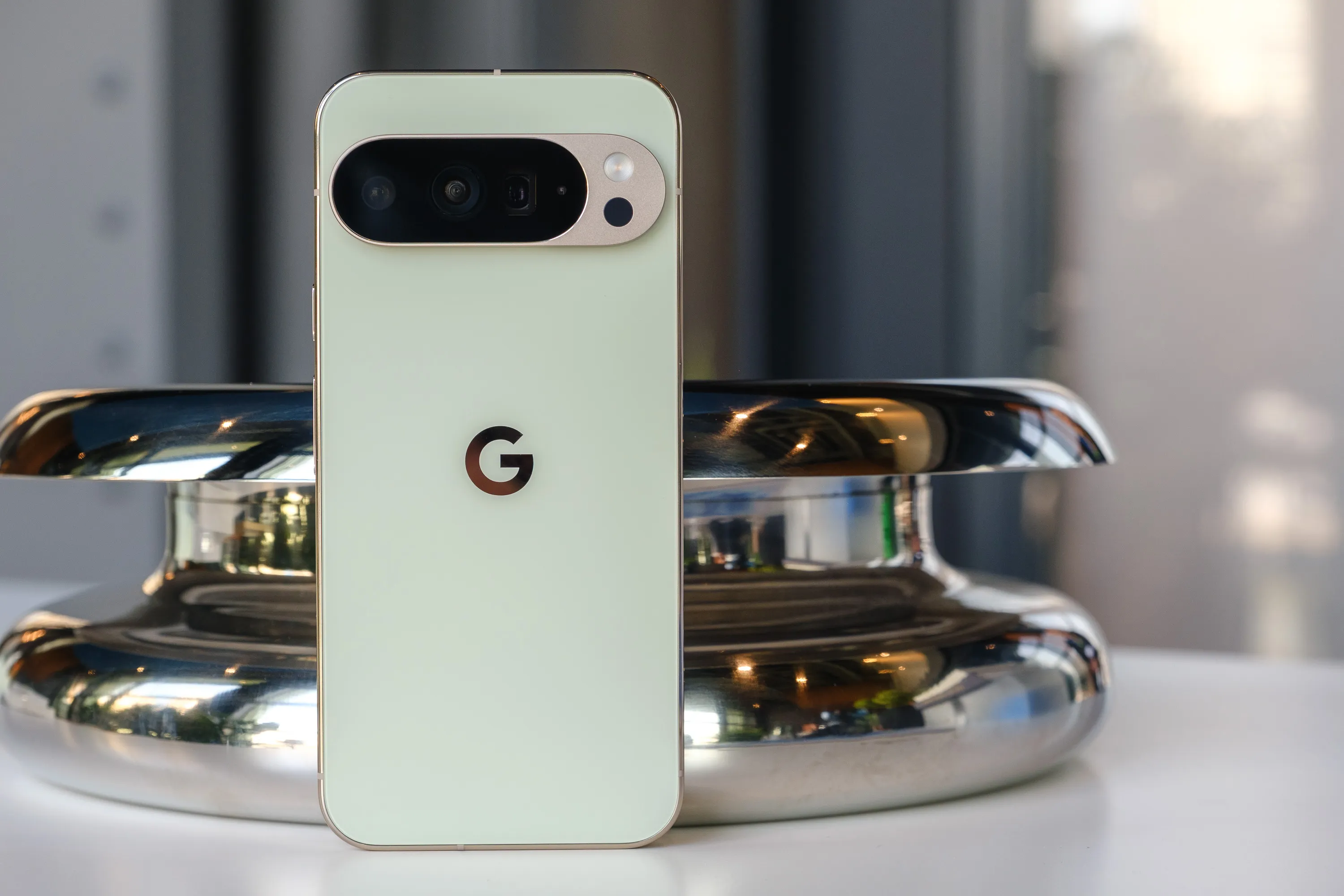 Google’s Pixel 10 Pro in jade green.