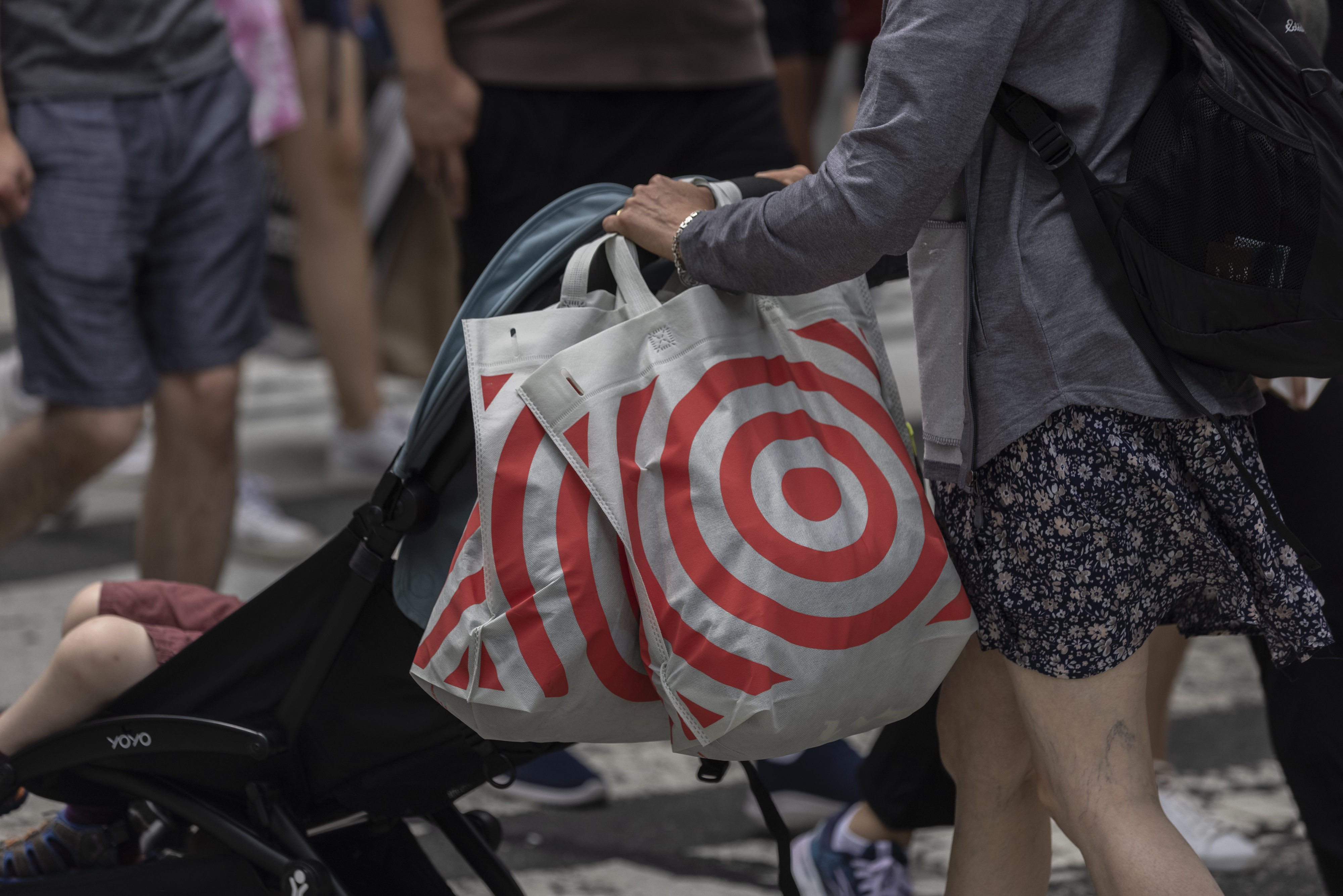A shopper carries Target bags in New York.