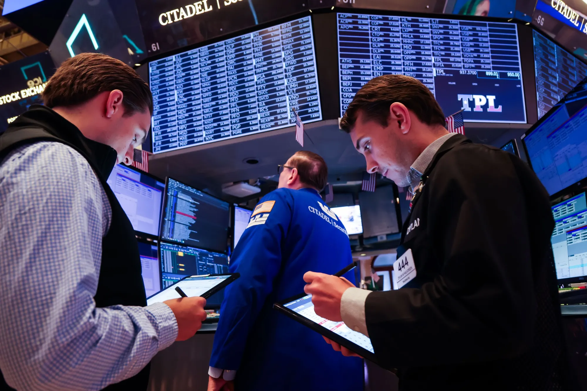 Traders work on the floor of the New York Stock Exchange.