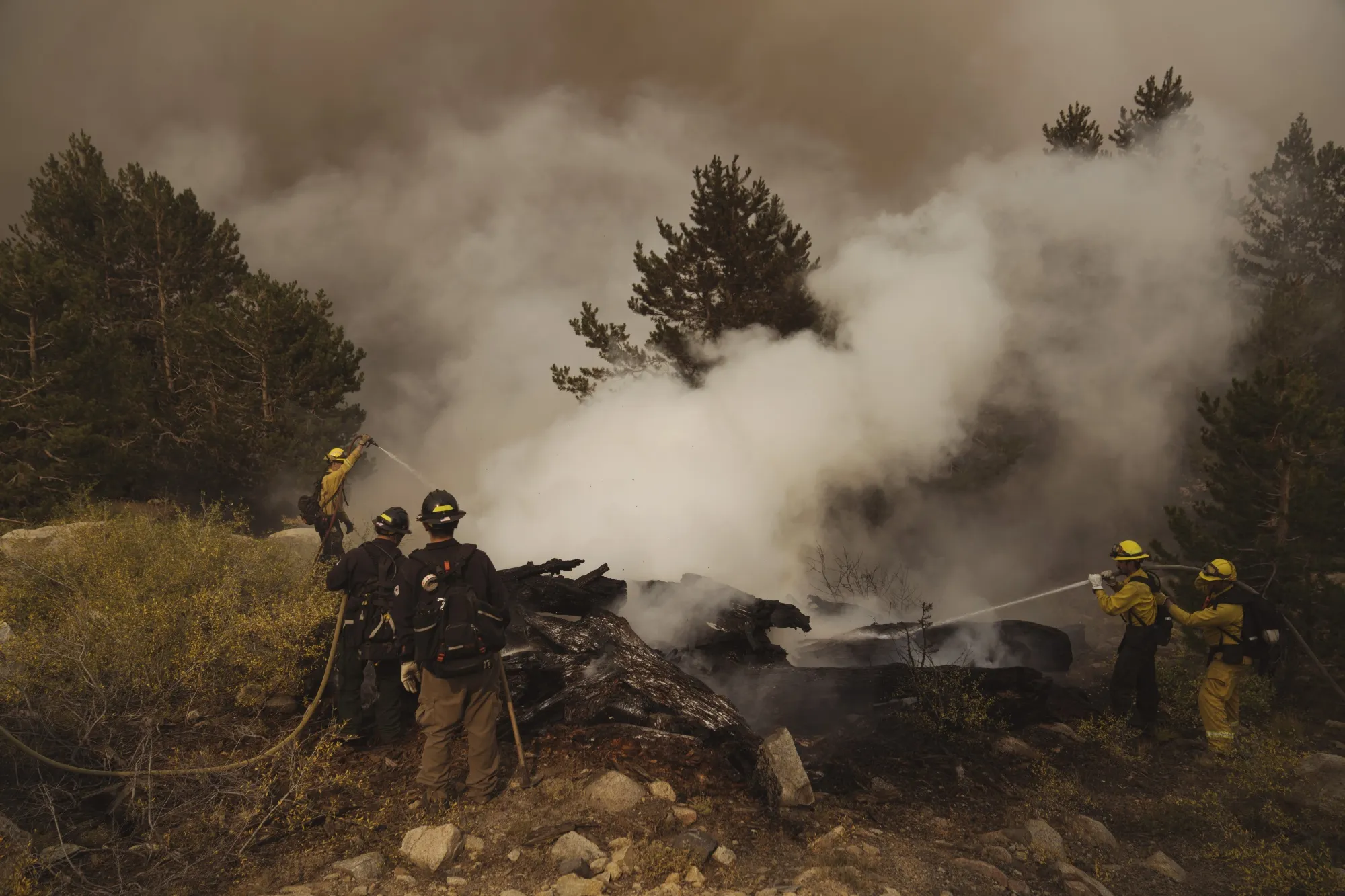 Firefighters work during the Caldor Fire in Kirkwood, California, on Sept. 3.