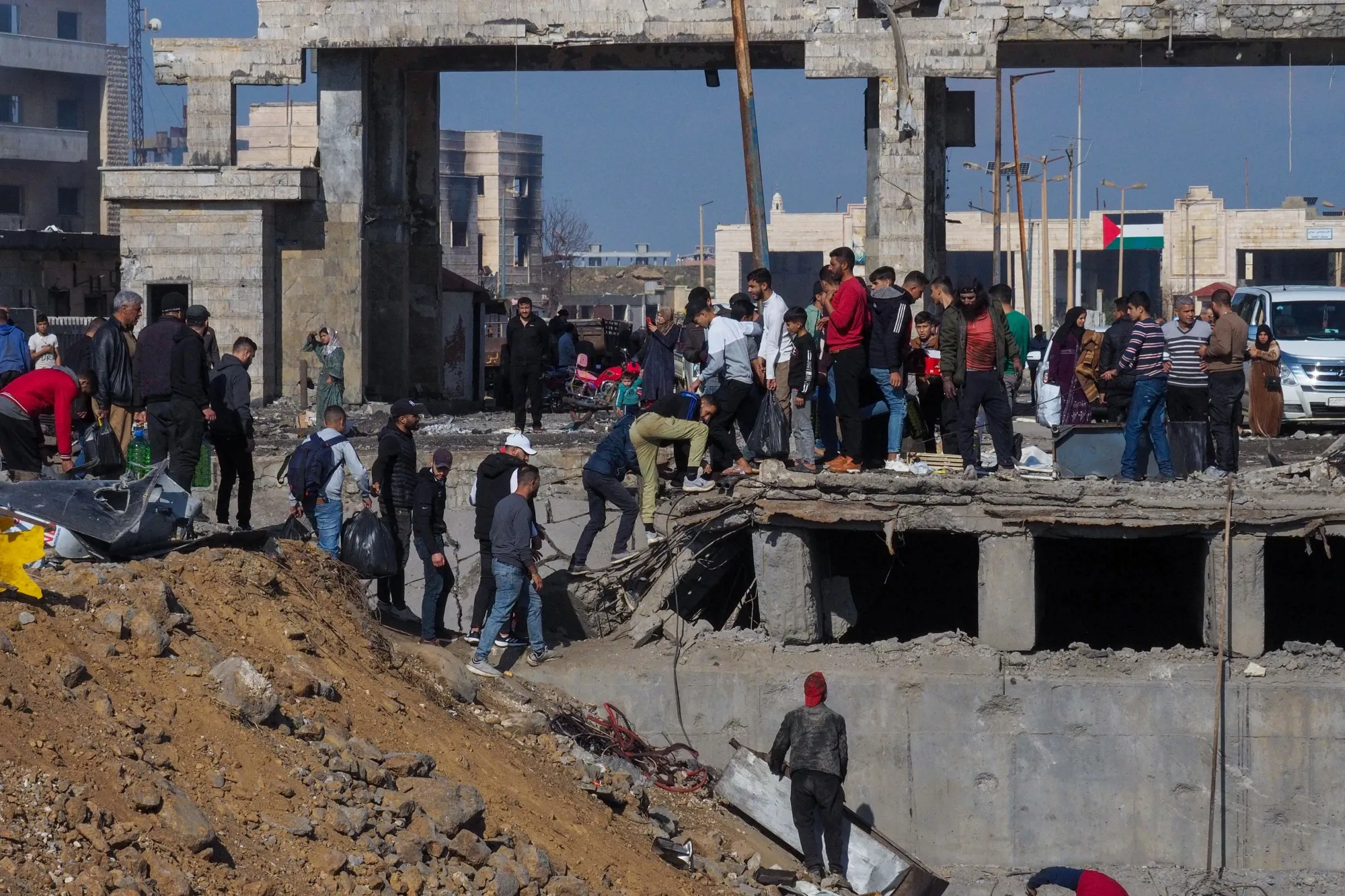 Refugees, who were living in Lebanon, cross the border between Syria and Lebanon&nbsp;on Dec. 9.&nbsp;