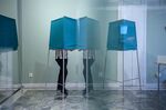 A voter casting a ballot during the Swedish general elections in Stockholm, on Sept. 9.