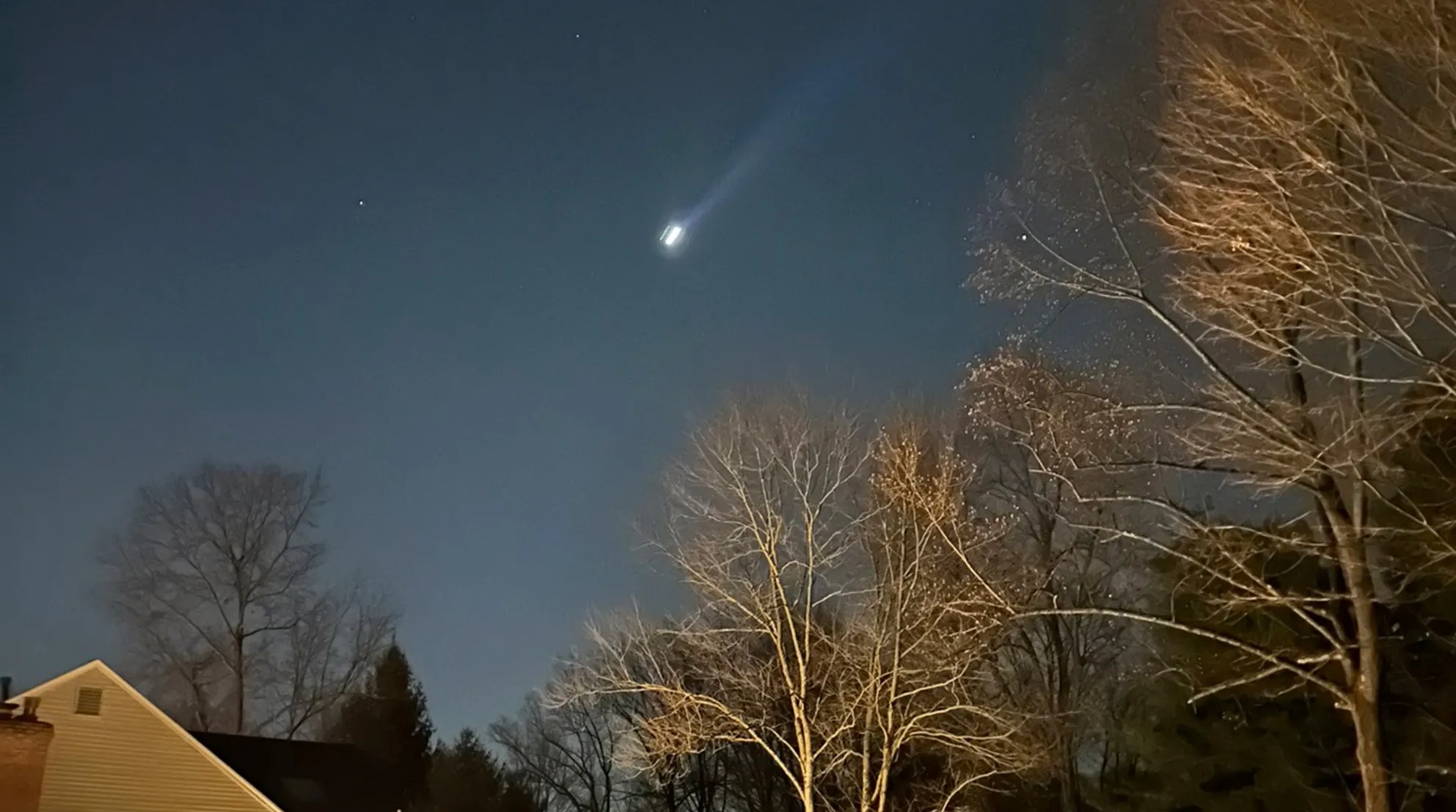 What appears to be multiple drones are seen flying over Bernardsville, New Jersey, on Dec. 5.