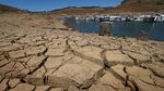 Dried mud and the remnants of a marina is seen at the New Melones Lake reservoir which is now at less than 20 percent capacity as a severe drought continues to affect California on May 24, 2015.
