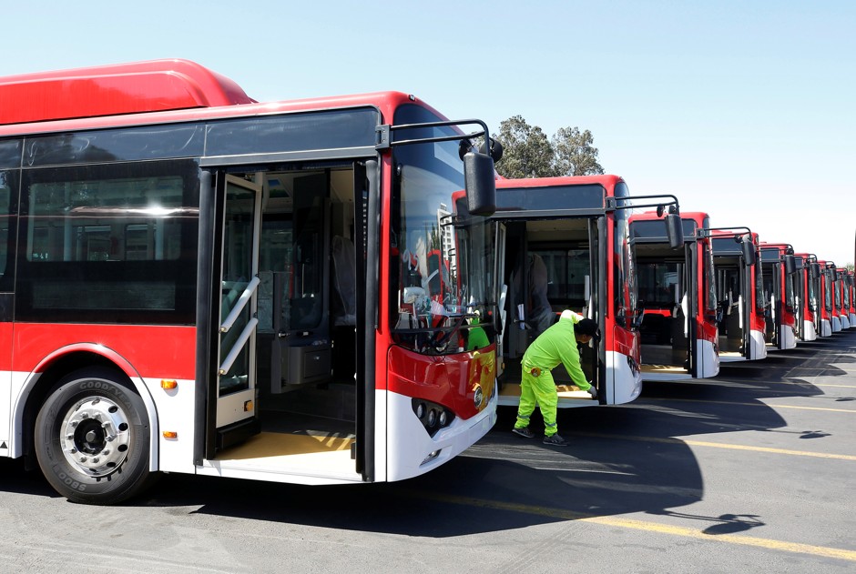 A fleet of electric buses in Santiago, Chile. Outside China, only a few cities have adopted the new technology.