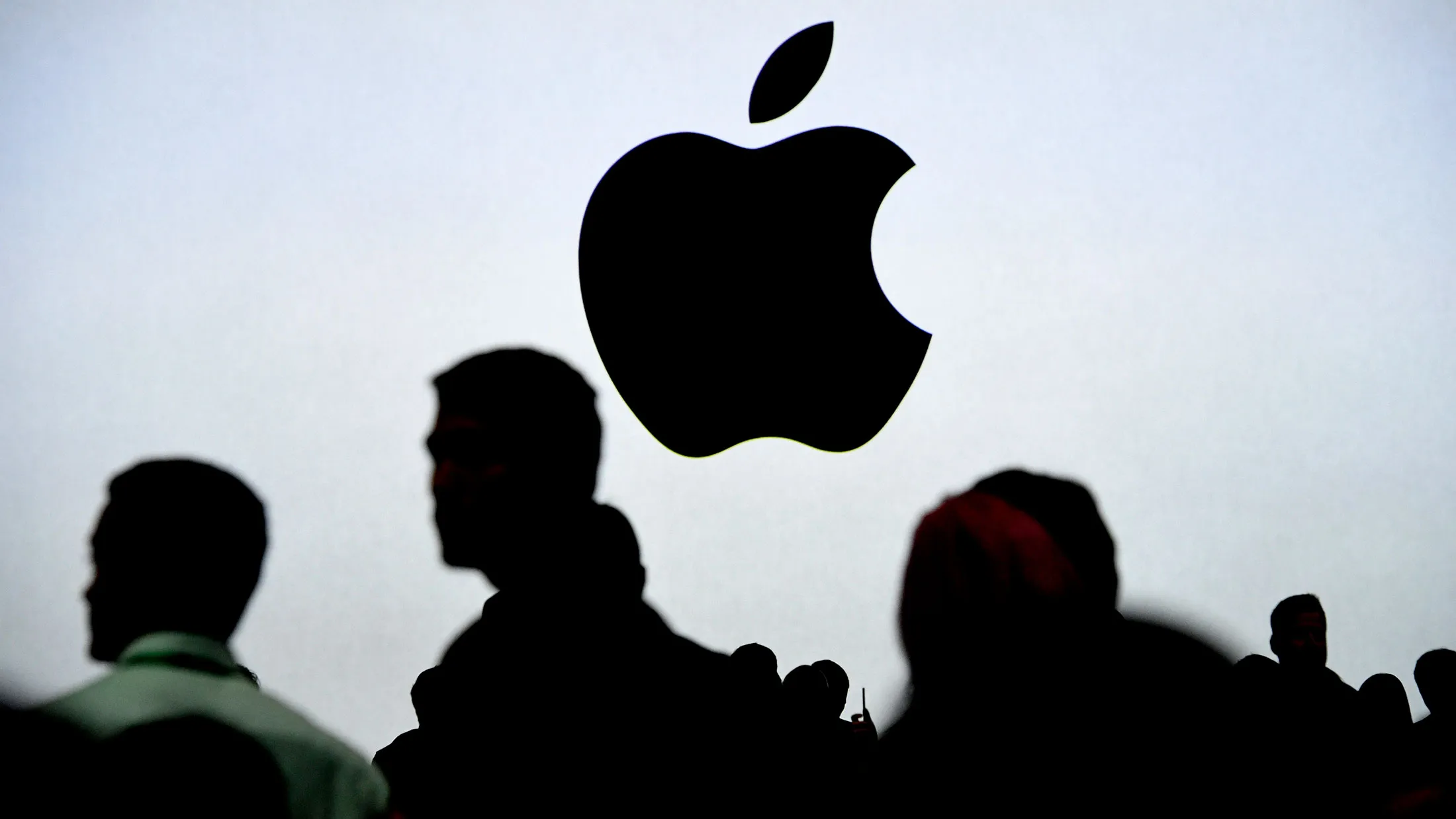 An Apple Inc. logo is displayed on a screen during the Apple Worldwide Developers Conference in San Jose, California, on June 5, 2017.
