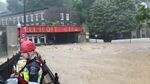 Floodwaters surge through Ellicott City, Maryland, on Sunday, May 27