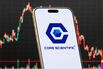 Core Scientific Logo Shown on Smartphone with Latest Stock Market Chart
