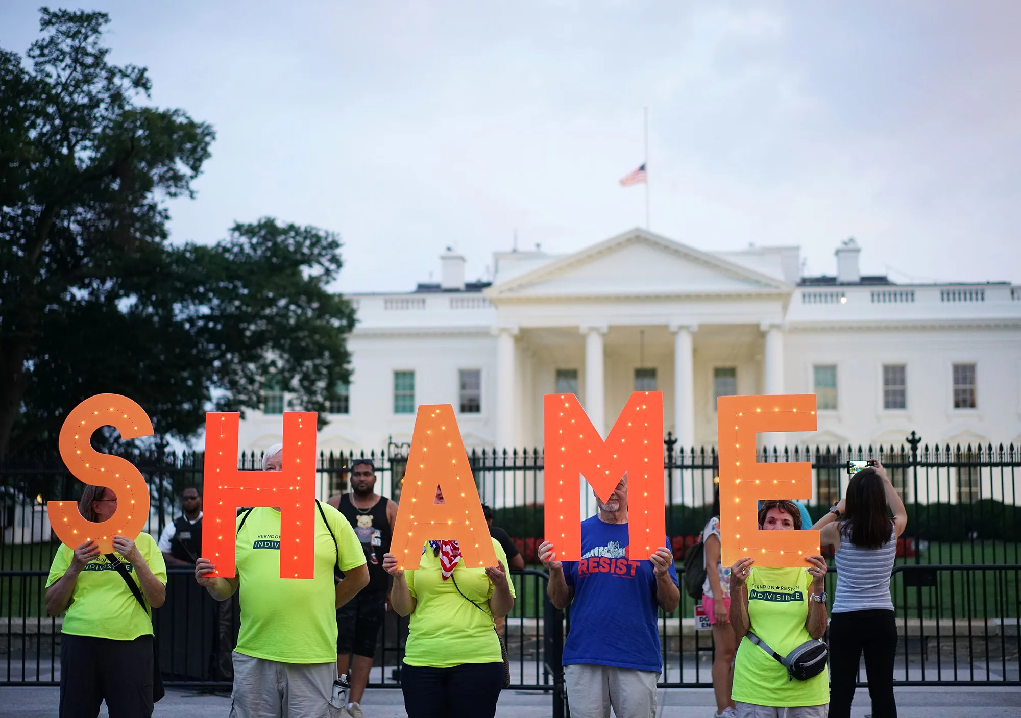 Demonstrators protest&nbsp;in front of the White House in Washington, D.C.