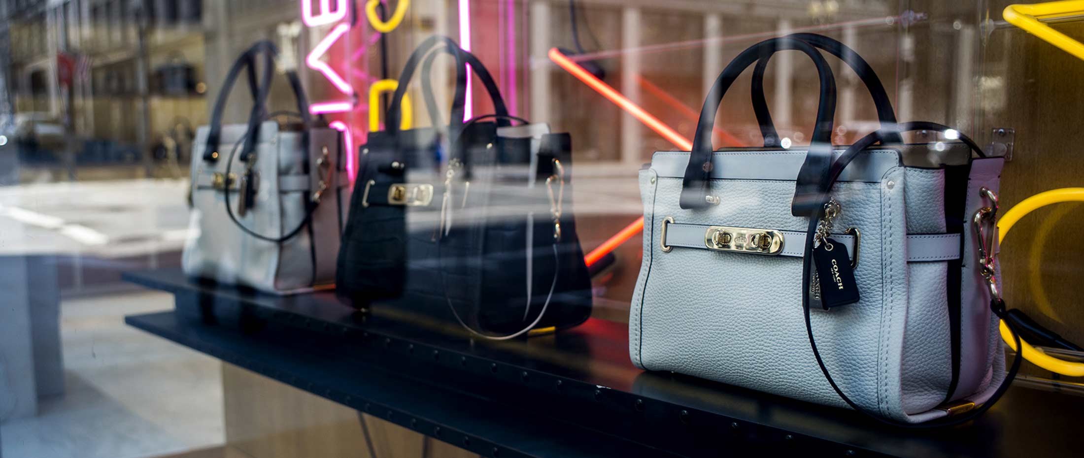 Tapestry's (TPR) Coach Tops Capri's (CPRI) Michael Kors in Handbag