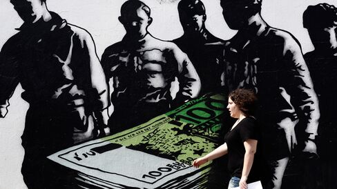 As world leaders struggle to keep Greece in the euro, artists are taking to the streets to express their own view of how the crisis should play out. Click image to see more.
