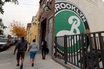 People walk past Brooklyn Brewery in the Brooklyn borough of New York City.
