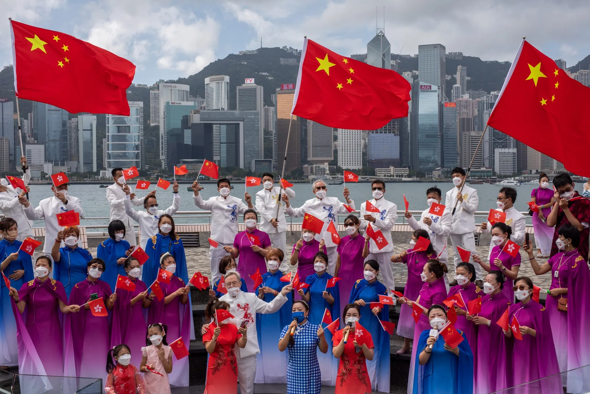 People celebrate Chinese National Day at Tsim She Tsui in Hong Kong.