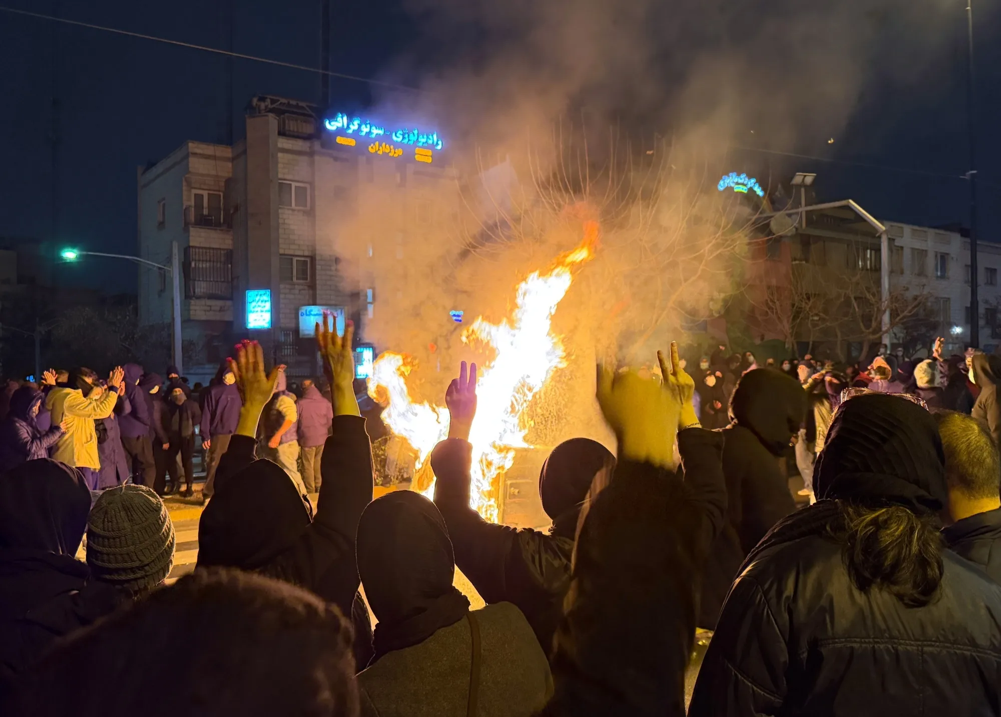 Iranians attend an anti-government protest in Tehran, on Jan. 9.