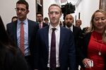 Mark Zuckerberg walks through the Russell Senate Office building in Washington on Sept. 19.