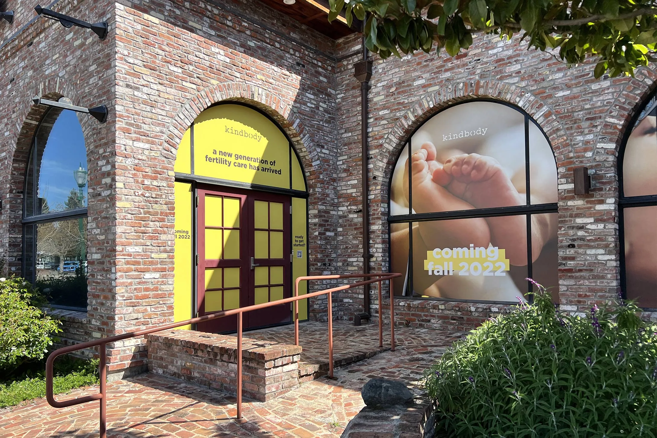 Signs announcing a new Kindbody fertility clinic in Walnut Creek, California, in April 2023.