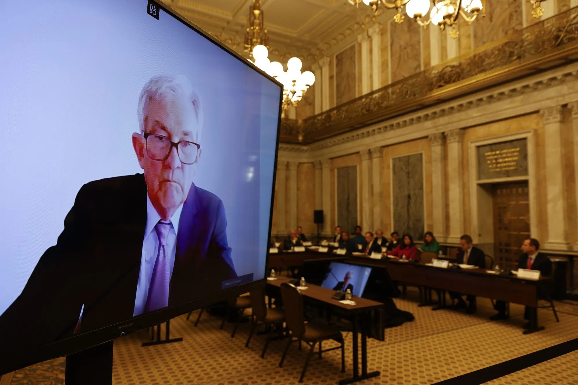 Jerome Powell, via teleconference.