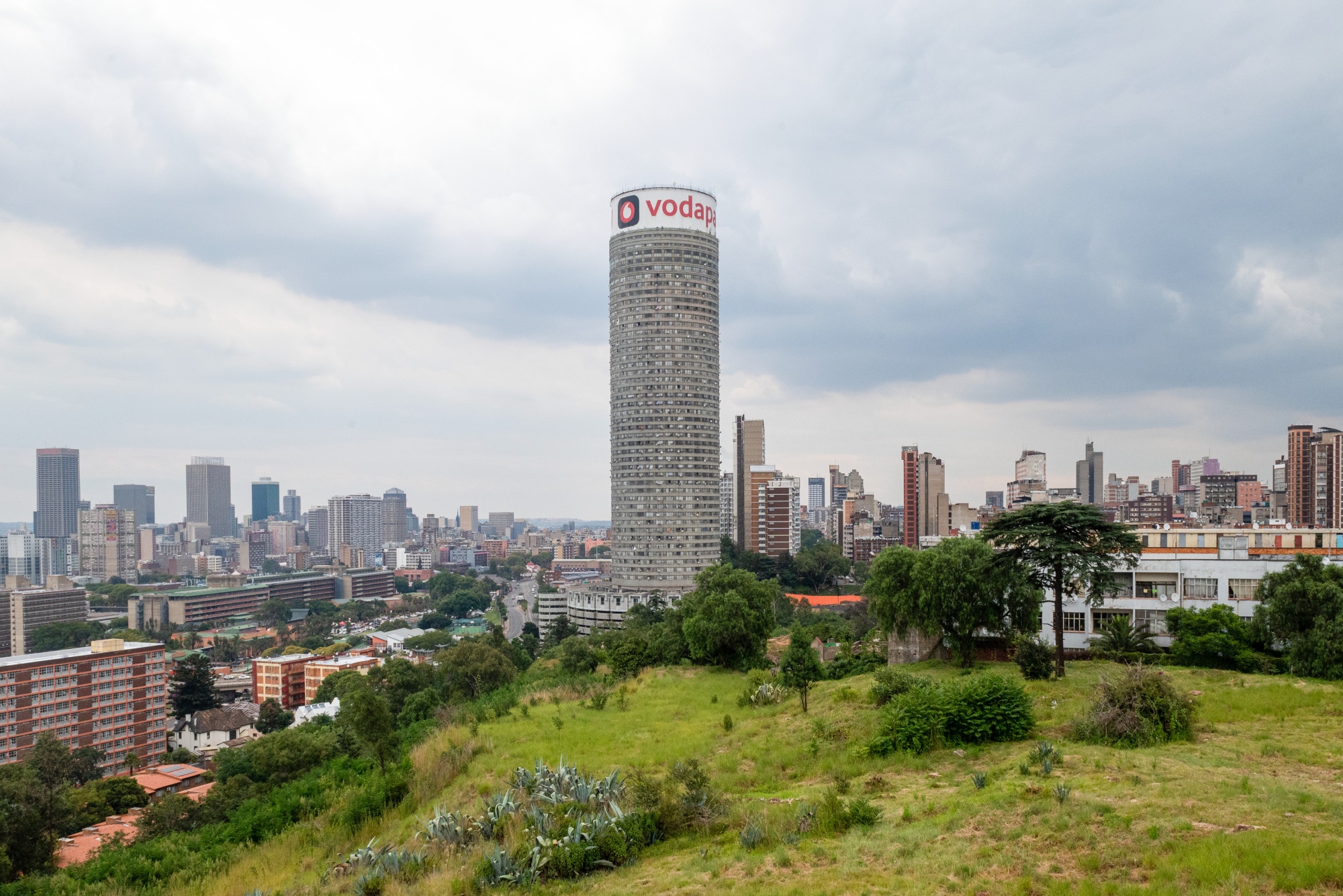 The Ponte tower residential building, centre, in Johannesburg, South Africa, on Wednesday, Feb. 18, 2026. South Africa’s unemployment rate dropped to the lowest level in more than five years in the fourth quarter, as the community and social services and construction sectors added workers. Photographer: Leon Sadiki/Bloomberg