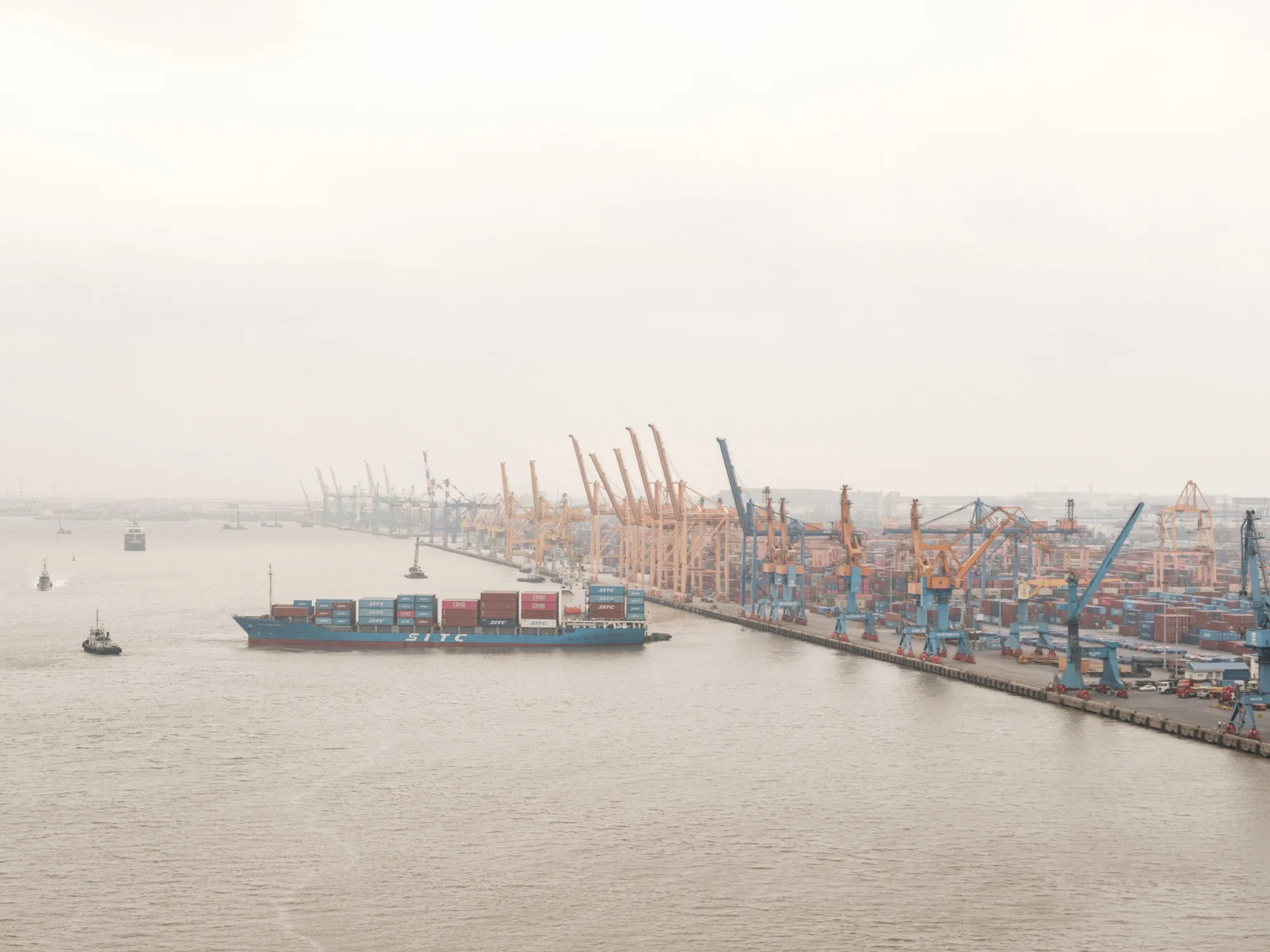 A container ship leaves the industrial port city of Haiphong in Vietnam, on March 31.