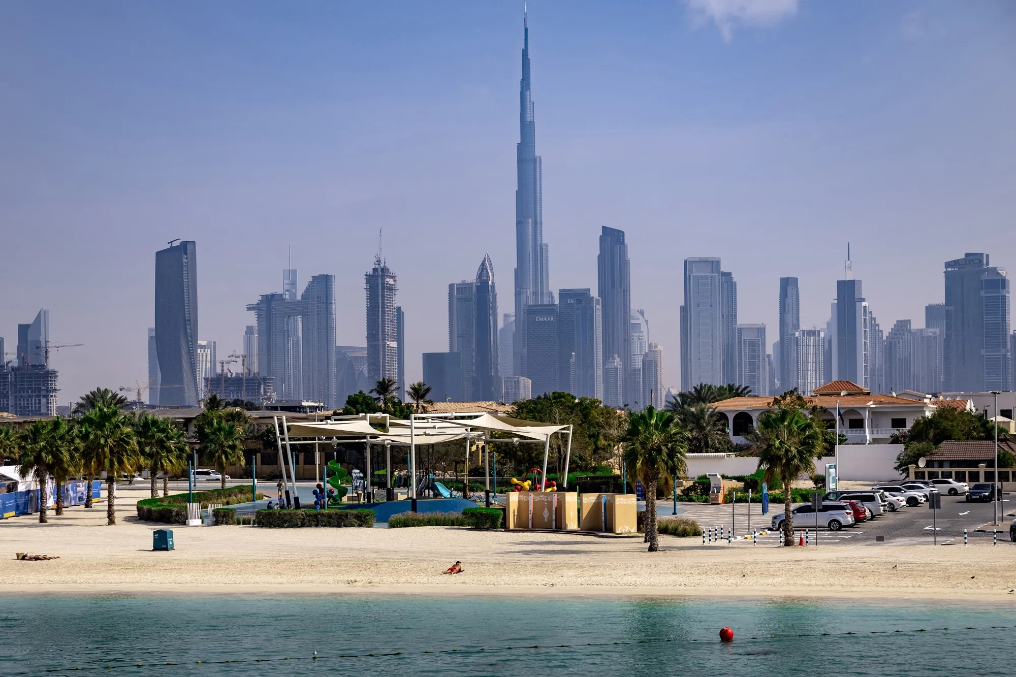 The Burj Khalifa on the skyline beyond Jumerah beach, in Dubai.